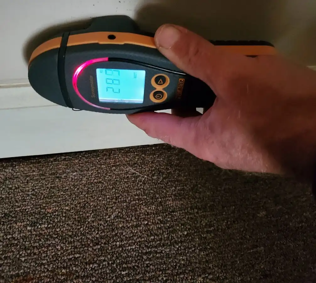 Moisture detection at baseboard during Mold Inspection & Testing in Lowell